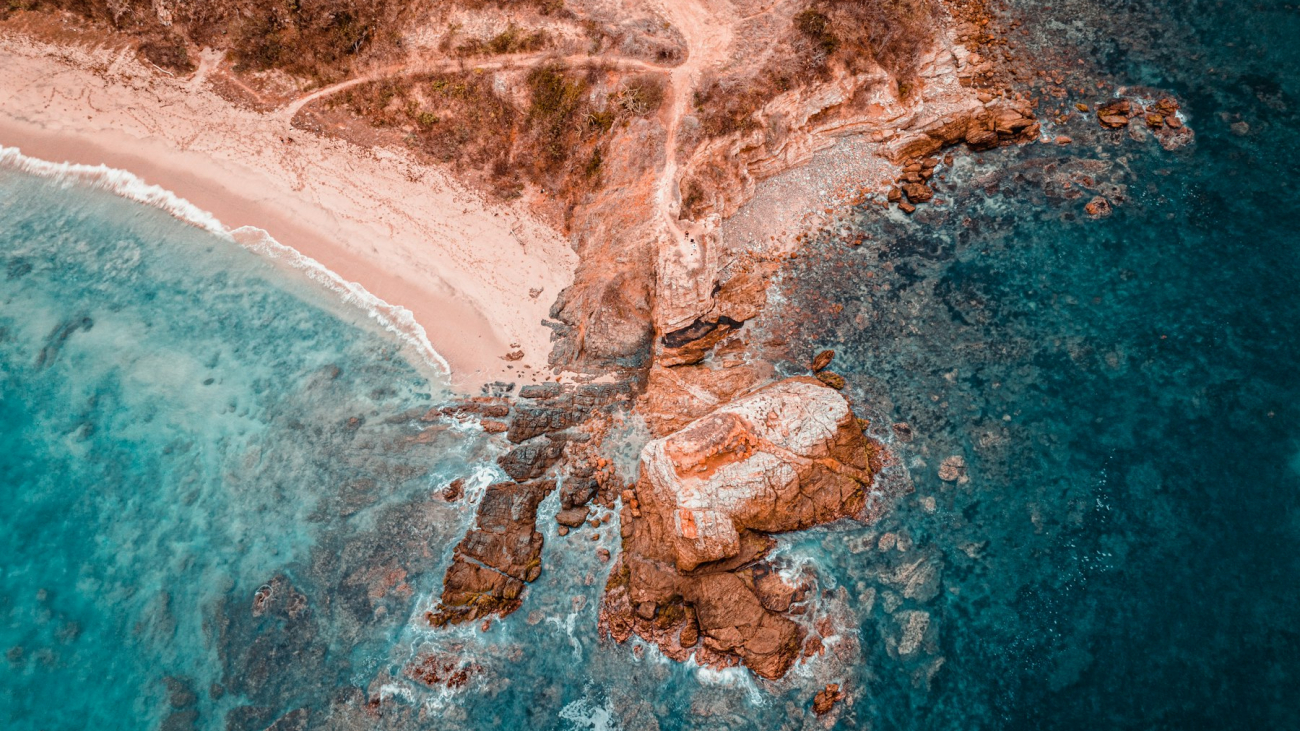 Aerial view of the rocky Punta Mita coastline, one of the best day trips from Sayulita