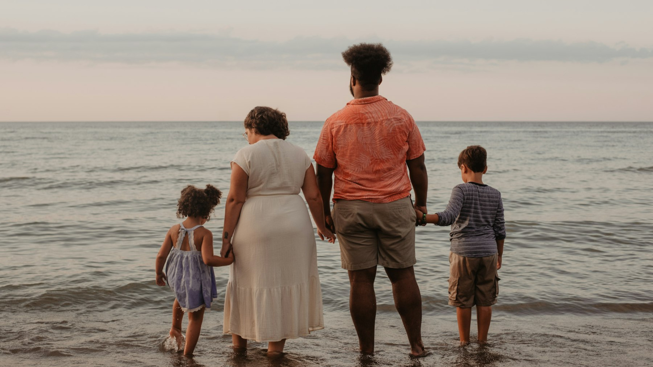 A family standing together on the seashore, a family reunion in Sayulita