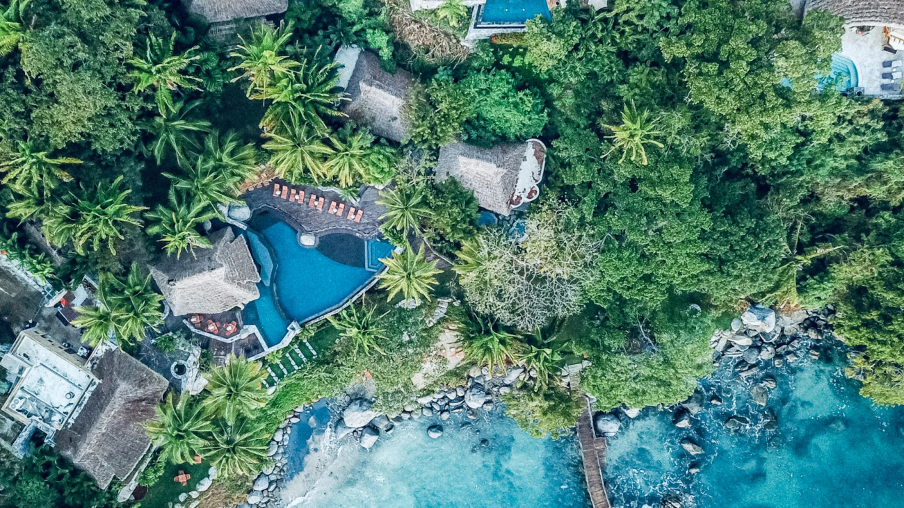 Aerial view of Sayulita surrounded by jungle and coastline, Sayulita travel guide