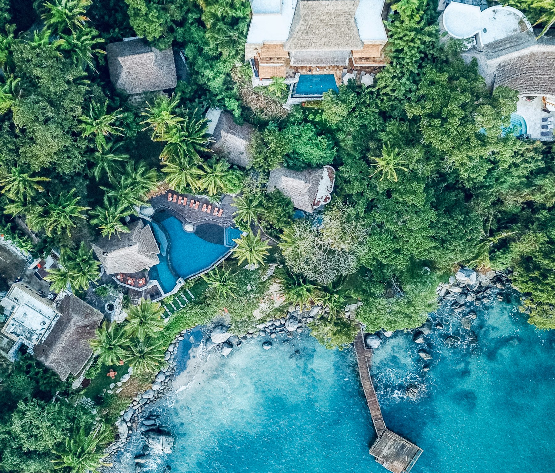 Sayulita from the air, the town set between jungle and coast