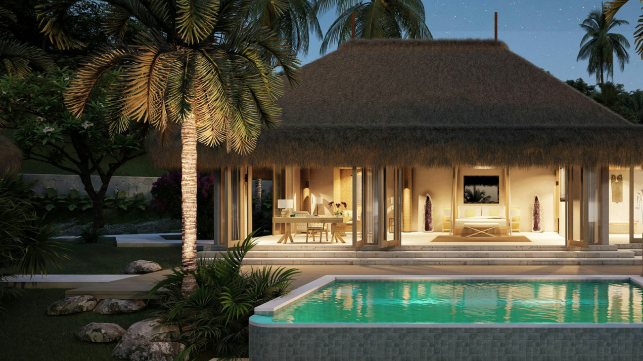 A private villa pool lit up at twilight, the kind of quiet evening scene a week at a Sayulita villa is built around
