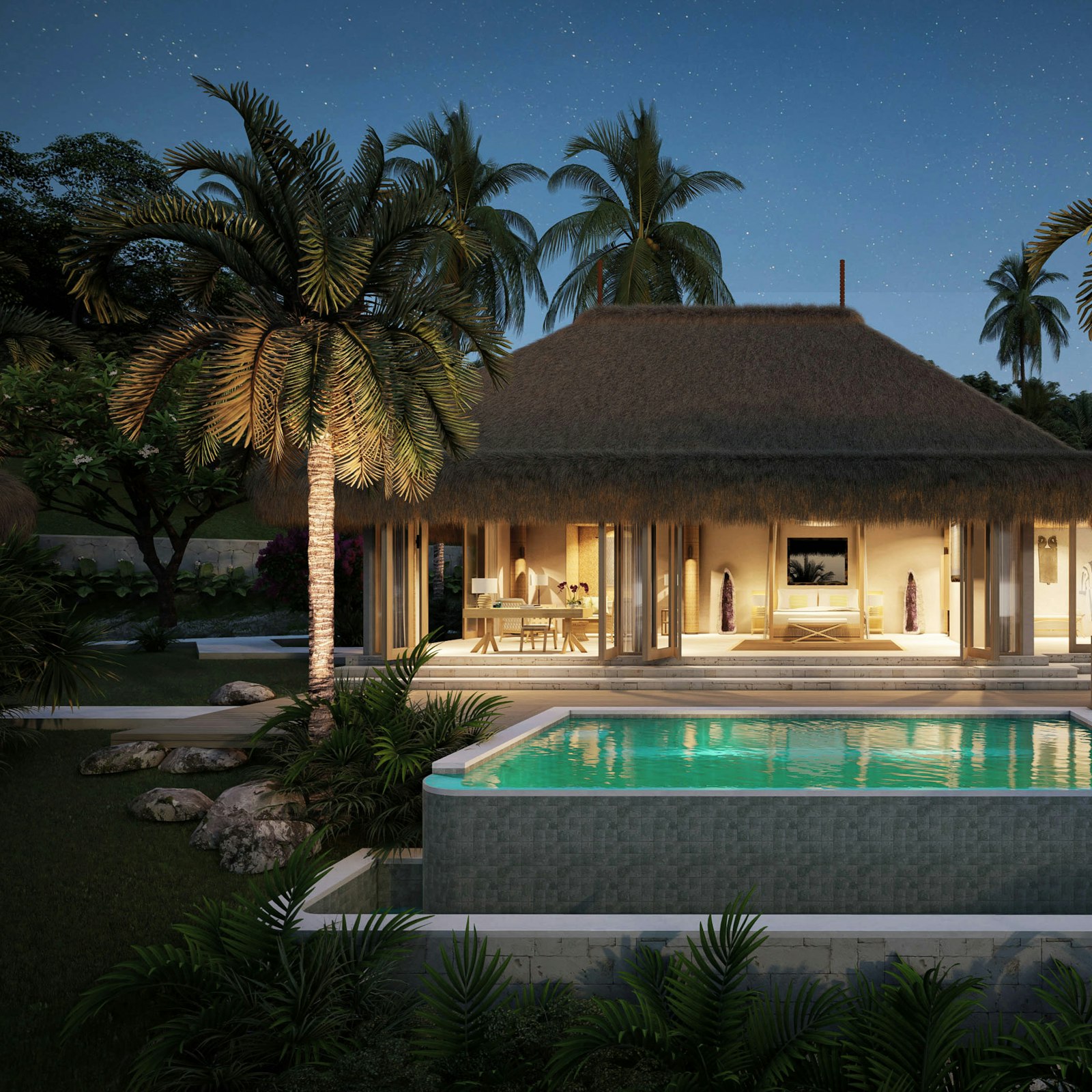 A villa pool lit at twilight in Sayulita