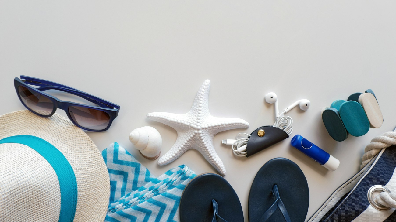 Beach essentials laid out on a surface — what to pack for Sayulita